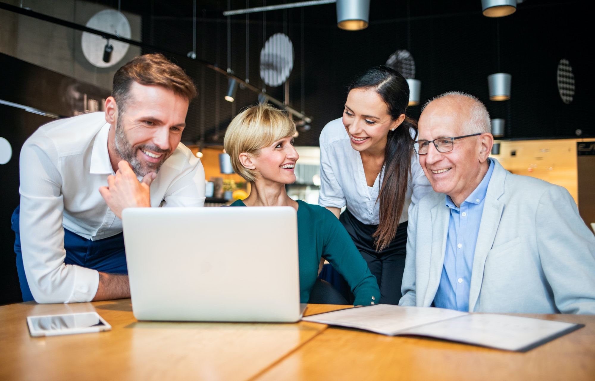 Business people talking about project in a cafe